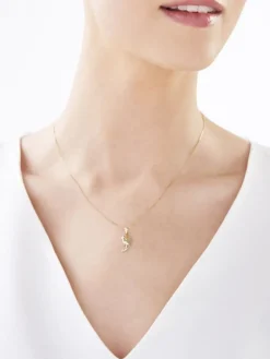 Apart Zawieszka z żółtego złota z diamentem - medalik Matka Boska - 0,004 ct - próba 375< Zawieszki