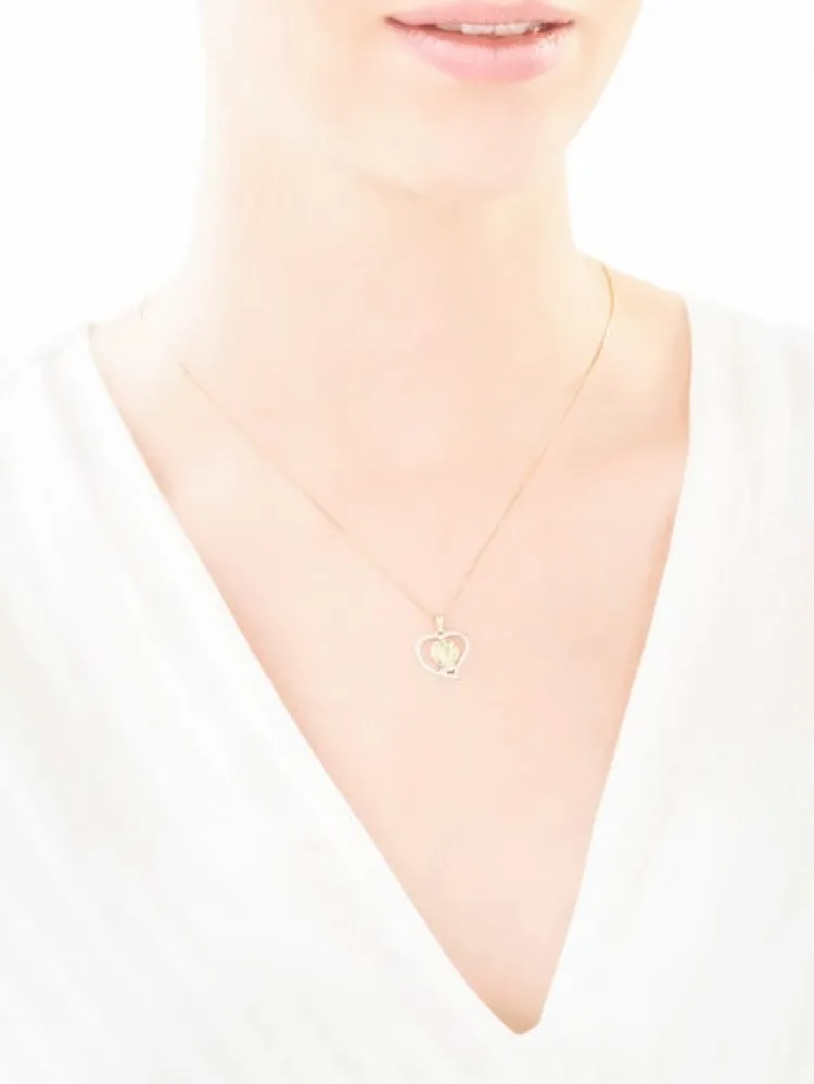 Apart Zawieszka z żółtego złota z diamentami - medalik Matka Boska, serce - 0,01 ct - próba 375< Zawieszki