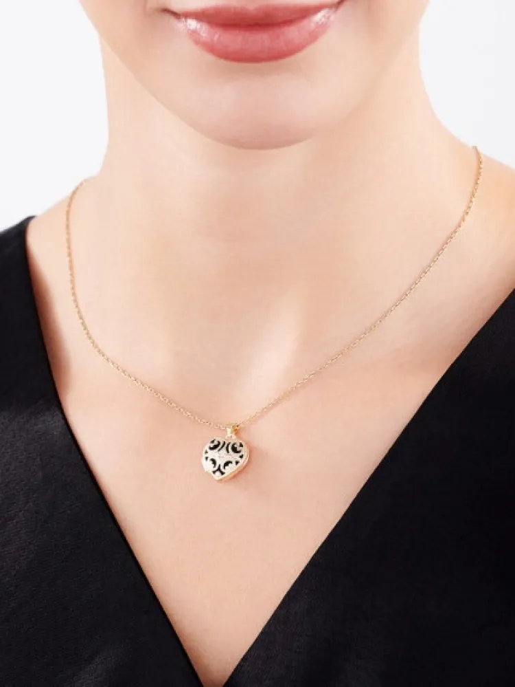 Apart Zawieszka z żółtego złota z diamentem - puzderko - serce - 0,01 ct - próba 375< Zawieszki