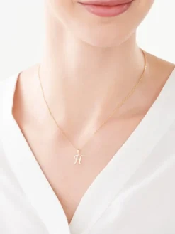 Apart Zawieszka z żółtego złota z diamentem - litera H - 0,003 ct - próba 375< Zawieszki